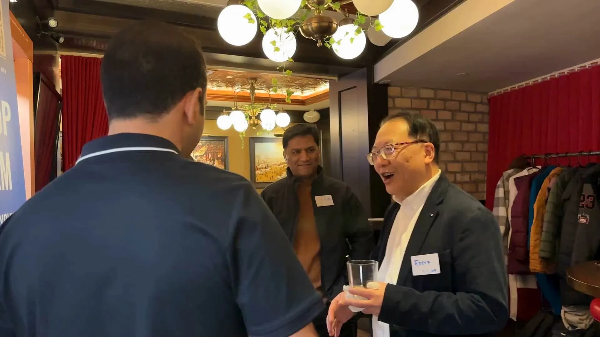 Eddie Lee speaking with business owners